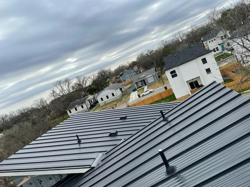 Standing seam metal roof panels with vents for Skylight Repair in Glendale